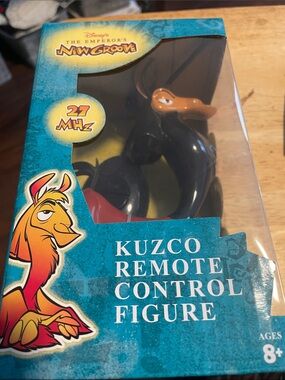 Disney Kuzco Remote Control Figure in Teal and Black Packaging